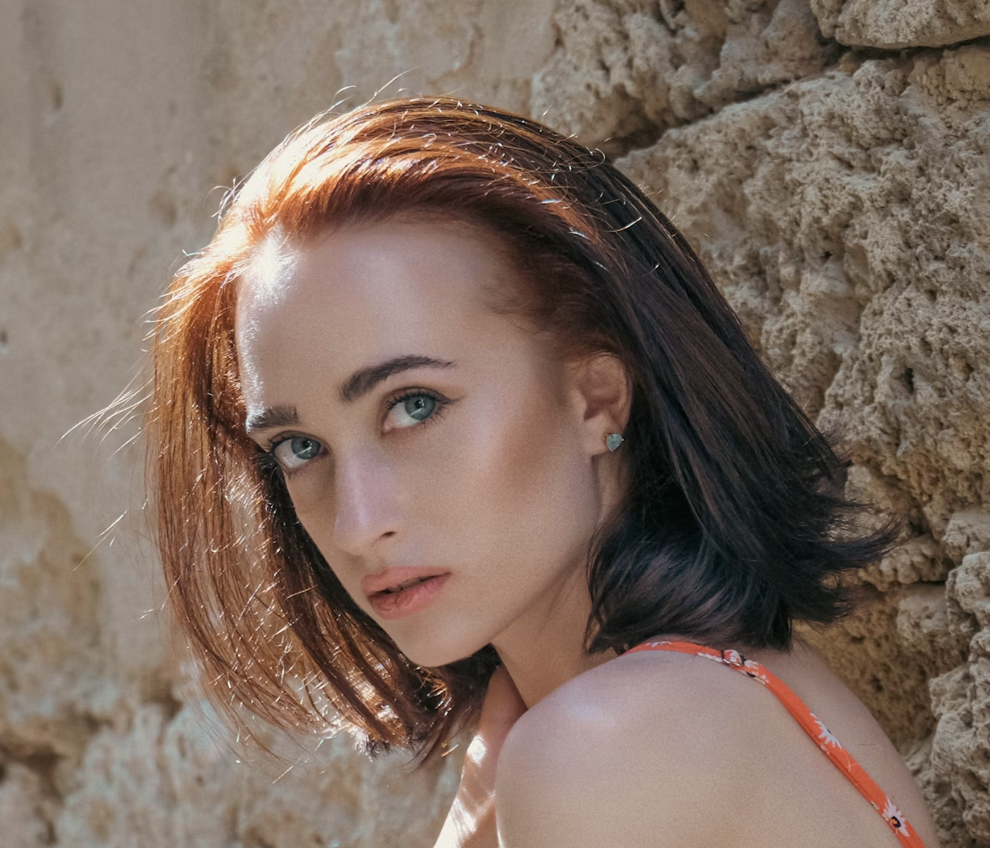 Red-haired woman close portrait